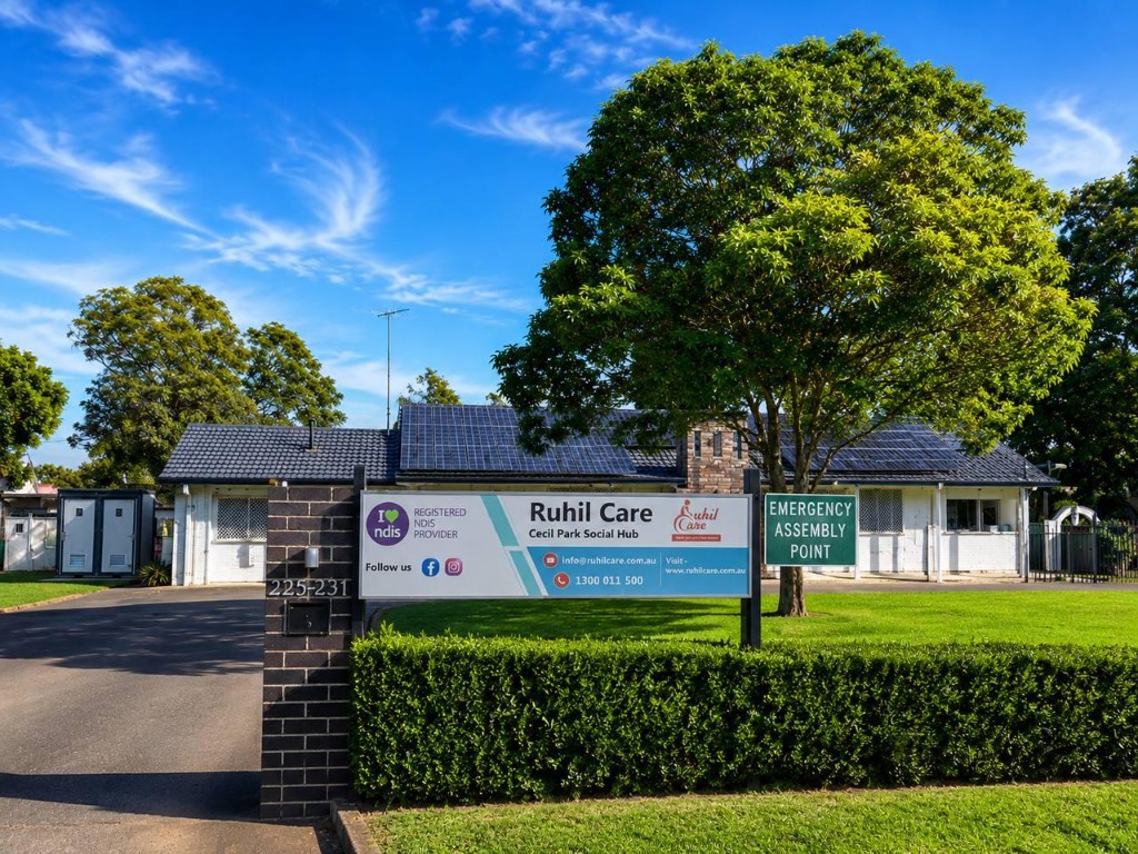 Ruhil Care Cecil Park Social Hub — registered NDIS provider sign at 225-231 Wallgrove Road